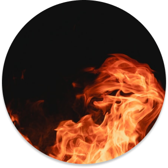 Image of fire roaring with a black background.